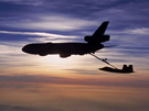 AIR_KC-10_Refuels_F-22_Sunset.jpg