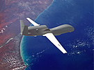 RQ-4 Global Hawk High Over Seashore