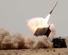 M270 firing M30 GMLRS