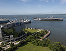 CVN 71 steams past HII HQ